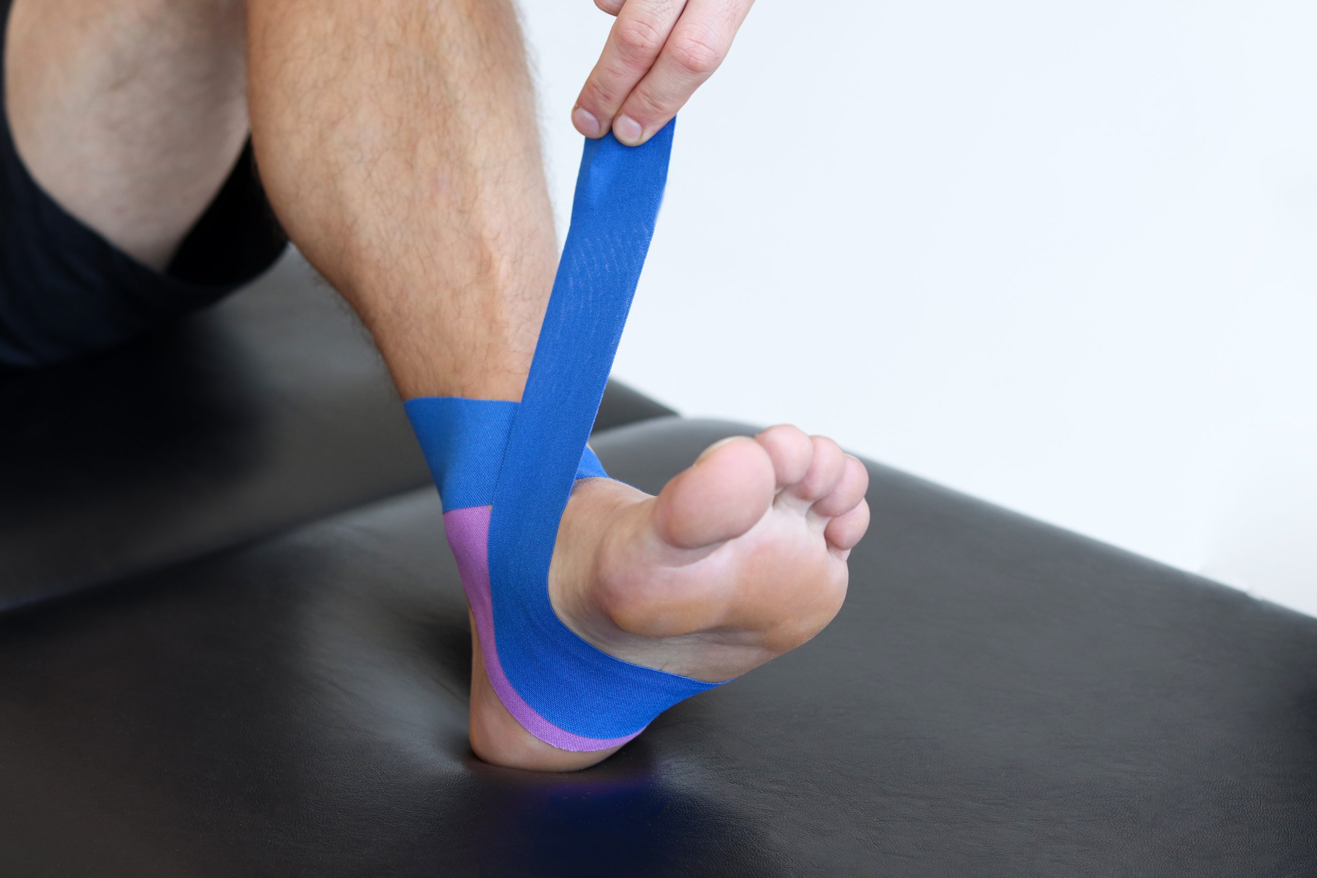 Kinesiology Taping in Physiotherapy: Benefits, Techniques & Sports Injury Recovery - Gallery Image 1